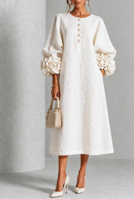IVY | Robe midi à motifs floraux avec manches à revers en forme de rose