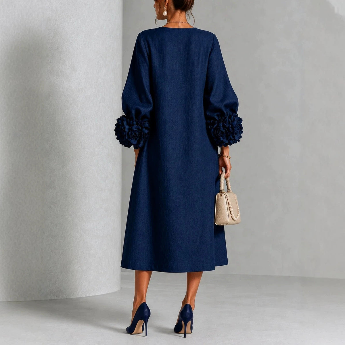 IVY | Robe midi à motifs floraux avec manches à revers en forme de rose