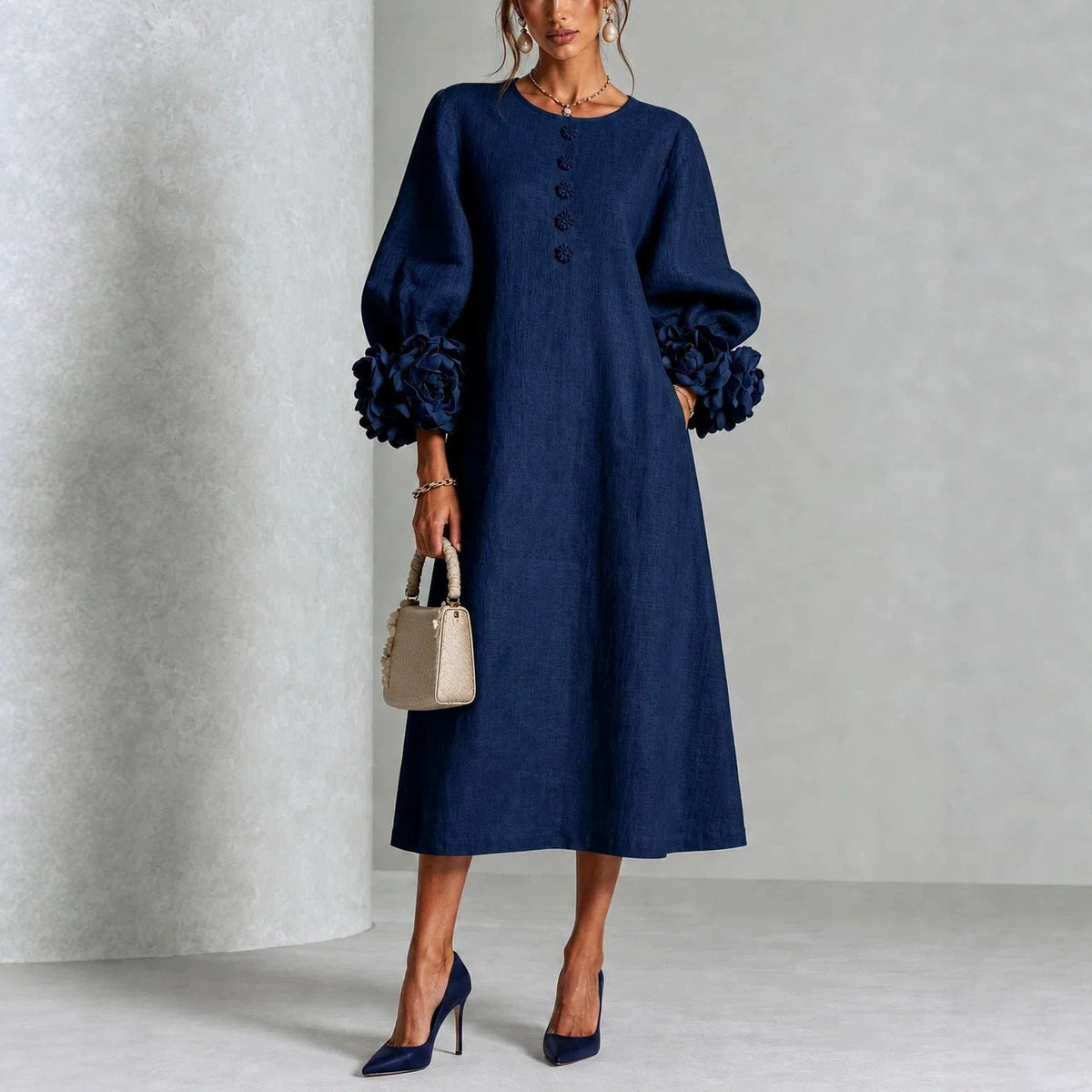 IVY | Robe midi à motifs floraux avec manches à revers en forme de rose