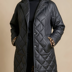 Manteau matelassé noir à doublure léopard